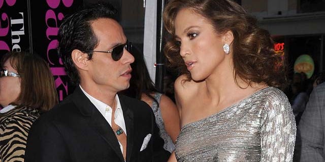 WESTWOOD, CA - APRIL 21: Singer Marc Anthony (L) and actress Jennifer Lopez arrive at the premiere of CBS Films' 'The Back-up Plan' held at the Regency Village Theatre on April 21, 2010 in Westwood, California. (Photo by Jason Merritt/Getty Images)