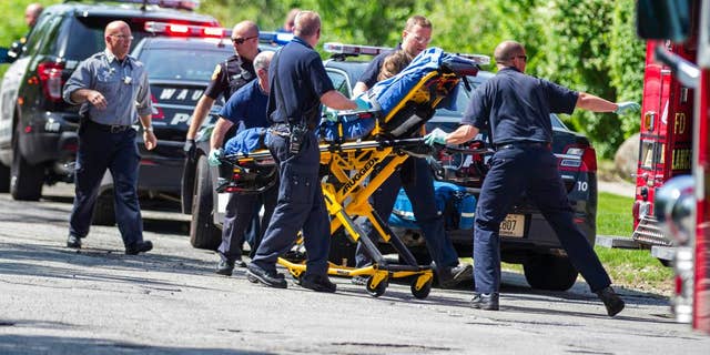 In this May 31, 2014 photo rescue workers take 12-year-old stabbing victim Payton Leutner to an ambulance in Waukesha, Wis. Two 13-year-old Wisconsin girls accused of stabbing Leutner to please online horror character Slender Man pleaded not guilty Friday. (AP)