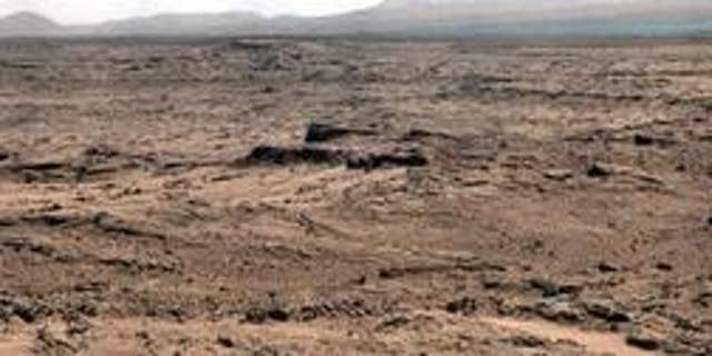 This panorama is a mosaic of images taken by the Mast Camera (Mastcam) on NASA's Mars rover Curiosity while the rover was working at a site called "Rocknest" in October and November 2012.