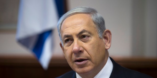 Israel's Prime Minister Benjamin Netanyahu attends the weekly cabinet meeting in Jerusalem on Sunday, Jan. 26, 2014. (AP Photos/Ronen Zvulun, Pool)