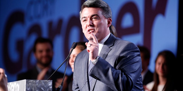 DENVER, COLORADO - NOVEMBER 4: U.S. Senator-elect Cory Gardner (R-CO) speaks with friends and family behind him after being declared the winner in the race at the Colorado Republican party's election night event at the Denver Tech Center Hyatt on November 4, 2014. Gardner defeated incumbent U.S. Sen. Mark Udall (D-CO). (Photo by Marc Piscotty/Getty Images)