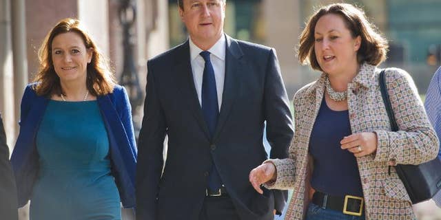 British Prime Minister David Cameron arrives at his hotel on the morning of the first day of the Conservative Party Conference in Manchester on September 29, 2013