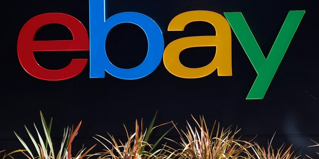 An eBay sign is seen at an office building in San Jose, California May 28, 2014. REUTERS/Beck Diefenbach (UNITED STATES - Tags: BUSINESS LOGO) - RTR3RALQ