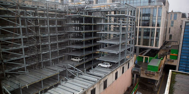 Cars found trapped in Edinburghâs ârobot car parkâ 15 years after "SkyPark" closed in 2003. Vehicles imprisoned in a disused robotic car park for more than a decade are set to be preserved by demolition crews after work to redevelop the building got underway. Jan 23 2018. See Centre Press story CPCARS; Eight vehicles stuck in a disused robotic car park for more than a decade will be preserved by demolition crews. The £5 million Autosafe "SkyPark" was hailed as Britainâs "most technologically advanced car park" when it opened in Edinburgh in 2001. But the tenure of the car park was short-lived after the company that operated it went into receivership in 2003. It was rumoured at the time that administrators had simply arrived one day to lock the doors, leaving dozens of cars trapped inside. And now, new pictures from a building opposite the site in the centre of Edinburgh show a "time capsuleâ with vehicles which look to be models from the late 1990s.