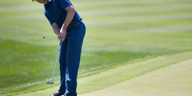 Aaron Baddeley, of Australia, putts on the ninth green during the second round of the Valero Texas Open golf tournament, Friday, March 27, 2015, in San Antonio. (AP Photo/Darren Abate)
