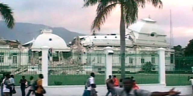 A view of Haiti's Presidential Palace, damaged after an earthquake struck, in Port-au-Prince in this January 12, 2010 video grab. A major earthquake hit impoverished Haiti on Tuesday, toppling buildings in the capital Port-au-Prince, burying residents in rubble and causing many deaths and injuries, witnesses in the city said. REUTERS/Reuters TV (HAITI - Tags: DISASTER ENVIRONMENT IMAGES OF THE DAY)