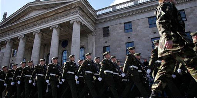 Thousands of soldiers march through the streets of Dublin, Ireland, Sunday, March 27, 2016. (AP Photo/Peter Morrison)