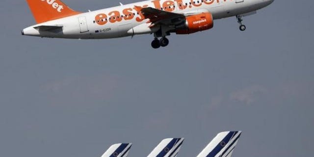 FILE: An easyJet aircraft takes-off. (Reuters/Christian Hartmann)