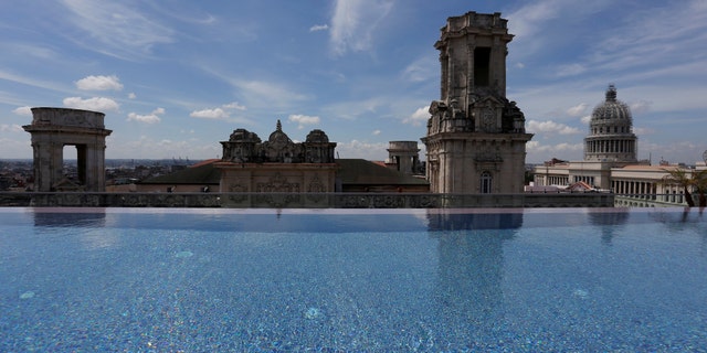 File photo: A historic building is seen from the rooftop infinity pool at the Gran Hotel Manzana, owned by the Cuban government and managed by Swiss-based Kempinski Hotels SA, in Havana, Cuba May 12, 2017. Picture taken May 12, 2017. (REUTERS/Stringer)