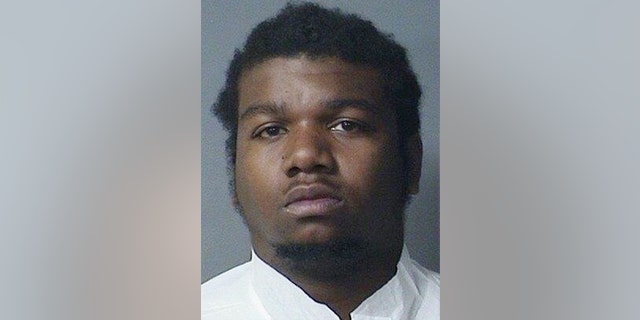 This booking photo made available by the Norfolk Police, Va., shows Rayvon A. Messer on Thursday, April 20, 2017. Authorities have charged Messer in the shooting death of his 3-year-old-son. Messer is being held without bail. (Norfolk Police via AP)
