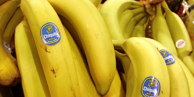 FILE - In this Aug. 3, 2005 file photo, Chiquita bananas are on display at a grocery store in Bainbridge, Ohio. Fruit supply companies Chiquita of the United States and Fyffes of Ireland said Monday, March 10, 2014, they had agreed to merge to create the world's biggest banana supplier. (AP Photo/Amy Sancetta, File)