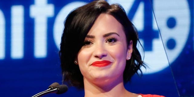 LOS ANGELES, CA - FEBRUARY 19: Presenter Demi Lovato speaks onstage at the 2nd Annual unite4:humanity presented by ALCATEL ONETOUCH at the Beverly Hilton Hotel on February 19, 2015 in Los Angeles, California. (Photo by Joe Scarnici/Getty Images for Variety)