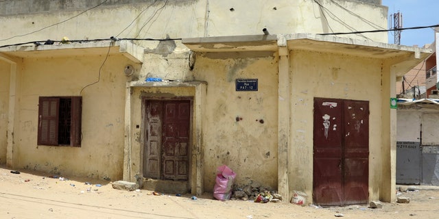 A house where 33 people are being quarantined because of the Ebola virus is seen in Dakar September 2, 2014. REUTERS/Emma Farge