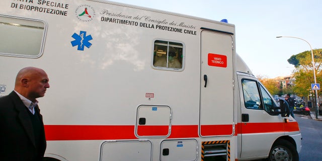 An ambulance carrying an Italian doctor, who contracted Ebola while working in Sierra Leone, arrives at the Lazzaro Spallanzani infectious diseases institute in Rome November 25, 2014. REUTERS/Tony Gentile