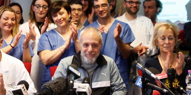 Italian Doctor Fabrizio Pulvirenti (C) attends a news conference at the Spallanzani hospital in Rome January 2, 2015. REUTERS/Remo Casilli