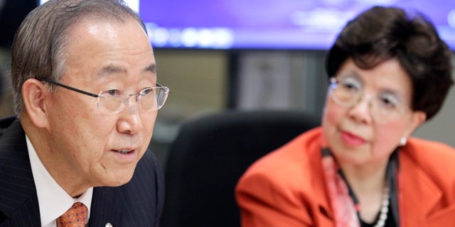 United Nations Secretary-General Ban Ki-moon (L) and World Health Organization(WHO) Director-General Margaret Chan attend a meeting in the WHO Strategic Health Operations Centre (SHOC) room at the WHO headquarters in Geneva October 1, 2014. REUTERS/Pierre Albouy