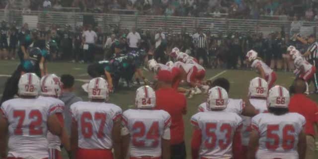 A high school coach in Orange County, Calif., said his team faced racist signs, chants during a football game.