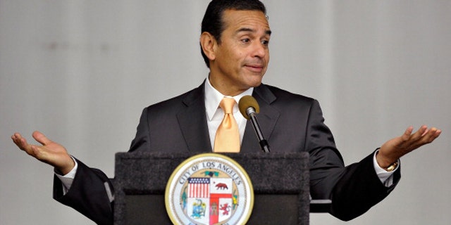 LOS ANGELES, CA - NOVEMBER 21: Los Angeles Mayor Antonio Villaraigosa and will.i.am announce partnership with Americans Promoting Study Abroad and Major Beijing Concert to benefit Study Abroad at Mendez Learning Center on November 21, 2011 in Los Angeles, California. (Photo by Jerod Harris/Getty Images for BGR)