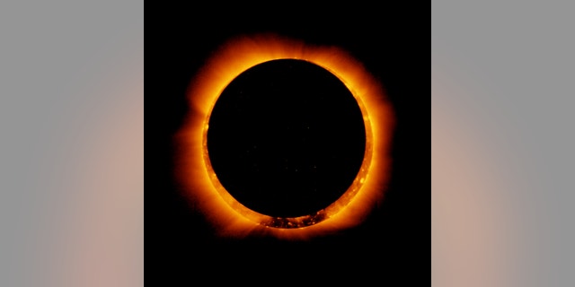In this picture of a solar eclipse, the moon is beginning to move from its position in front of the sun.
