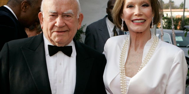 Ed Asner, left, and Mary Tyler Moore, from television's "The Mary Tyler Moore Show" pose together at the 13th Annual Screen Actors Guild Awards on Sunday, Jan. 28, 2007, in Los Angeles. (AP Photo/Chris Carlson)