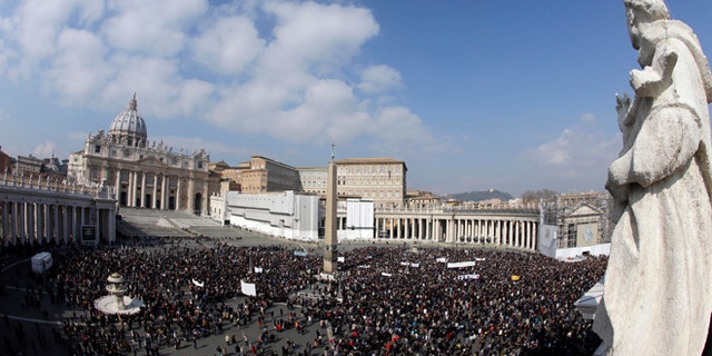 Faithful gather to listen to Pope Benedict XVI's Angelus Prayer in St. Peter's Square at the Vatican on Feb. 17, 2013.