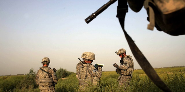U.S. soldiers with the 3rd Armored Cavalry Regiment participate in a patrol on July 17, 2011 in Iskandariya, Babil Province, Iraq. (Photo by Spencer Platt/Getty Images)