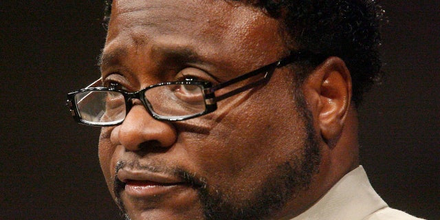 In this Sept. 26, 2010 file photo, Bishop Eddie Long speaks at New Birth Missionary Baptist Church near Atlanta.