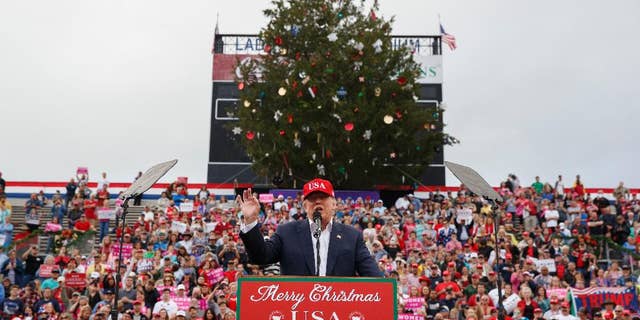 FILE - In this Saturday, Dec. 17, 2016, file photo, President-elect Donald Trump speaks during a rally at Ladd-Peebles Stadium in Mobile, Ala. Authorities in Mobile said the tree cut down in a city park and used as a prop at Trump’s recent rally will be used to build cat scratching posts and bird houses. The mayor’s chief of staff apologized for his role in having the large cedar tree cut down, saying he was “overzealous” in trying to meet expectations of Trump’s team. (AP Photo/Evan Vucci, File)