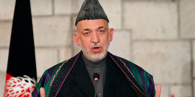 Dec. 14, 2011: Afghan President Hamid Karzai speaks during a joint news conference with U.S. Defense Secretary Leon Panetta, unseen, at the presidential palace in Kabul, Afghanistan.