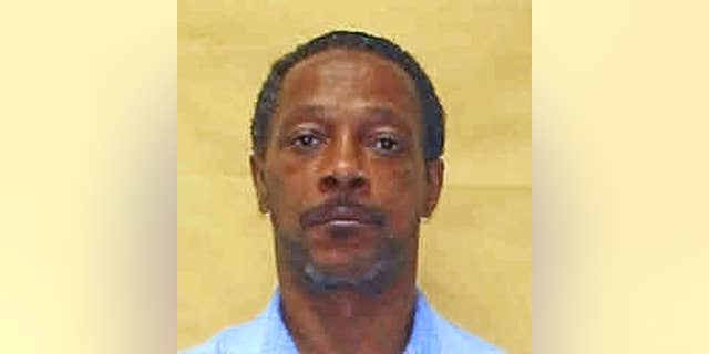 This undated photo provided by the Ohio Department of Rehabilitation and Correction shows Evin King, who has spent 23 years in an Ohio prison for the 1994 strangulation of his girlfriend Crystal Hudson. King, who has maintained his innocence, could be released soon after Cuyahoga County, Ohio, Prosecutor Michael O'Malley's office in Cleveland asked a court Monday, April 17, 2017, to vacate King's conviction, based on advances in DNA testing and interpreting forensic evidence. (Ohio Department of Rehabilitation and Correction via AP)
