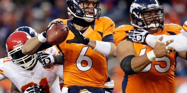 FILE - In this Dec. 30, 2012, file photo, Denver Broncos quarterback Brock Osweiler (6) sets to throw a pass in the fourth quarter of an NFL football game against the Kansas City Chiefs in Denver. All eyes were on Broncos starting quarterback Peyton Manning this season, especially Osweiler's. If, heaven forbid, something should happen to the four-time MVP in the playoffs, the next man up is the four-time passer, a rookie from Arizona State who's biding his time much like Green Bay Packers quarterback Aaron Rodgers did with Brett Favre. (AP Photo/Joe Mahoney, File)