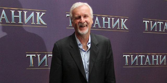 U.S. film director James Cameron poses for a photograph during a presentation for the media in Moscow March 29, 2012. Cameron is visiting the Russian capital to promote his film "Titanic 3D". REUTERS/Ivan Burnyashev (RUSSIA - Tags: ENTERTAINMENT)