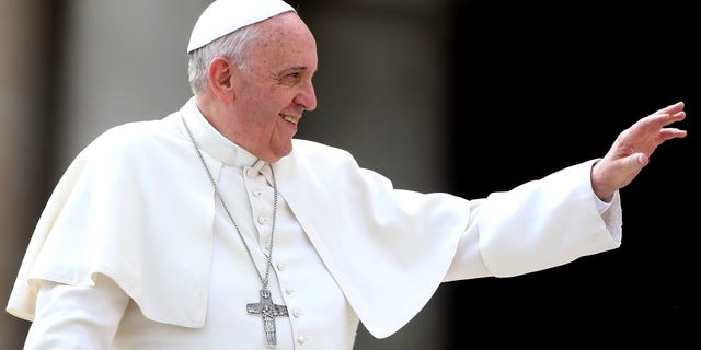 VATICAN CITY, VATICAN - MARCH 19: Pope Francis waves to the faithful as he holds his weekly audience in St. Peter's Square on March 19, 2014 in Vatican City, Vatican. Pope Francis celebrated the Feast of St. Joseph by saying the saint is a model for all fathers and educators. (Photo by Franco Origlia/Getty Images)