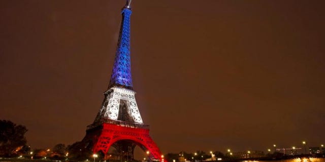 Nov. 16, 2015: The Eiffel Tower is lit with the blue, white and red colors of the French flag in Paris to pay tribute to the victims of a series of deadly attacks on Friday in the French capital.