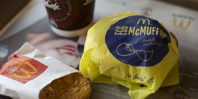 The man reportedly brandished his gun at the drive-thru worker who broke the news.