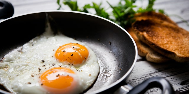 Fried eggs and toasted breads