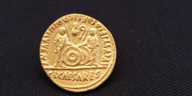 One of the gold coins dating back to the time of the Emperor Augustus (Egyptian Ministry of Antiquities)