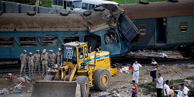 Two trains are seen after they collided just outside Egypt's Mediterranean port city of Alexandria, Friday.