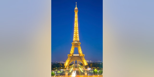 Paris - Jun 20: Eiffel Tower Light and Beam Performance Show at Dusk on Jun 20, 2014. Eiffel Tower is the highest monument in France use 20,000 light bulbs in the show.