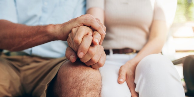 elderly hands couple istock large
