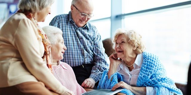 Group of senior friends chatting