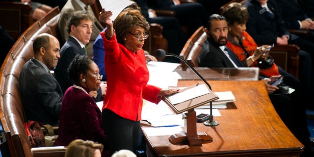 Jan. 6, 2017: Rep. Maxine Waters, D-Calif., holds up a written objection to the Electoral College vote and calls on a Senator to join in the objection during a joint session of Congress to count the electoral ballots, on Capitol Hill in Washington.