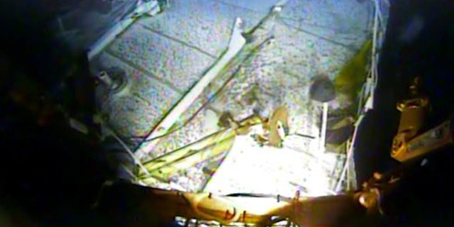 In this photograph released by the National Transportation Safety Board on Sunday, Jan. 3, 2016, the detached navigation bridge of the sunken freighter El Faro is seen on the seafloor, 15,000-feet deep near the Bahamas.