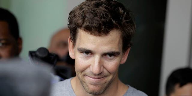 New York Giants quarterback Eli Manning talks to reporters during an availability ahead of the NFL Football draft, Thursday, April 20, 2017, in East Rutherford, N.J. (AP Photo/Julio Cortez)