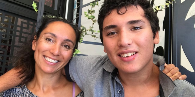 Kumar, here with her son Eli, claims she had medical approval for him to fly.