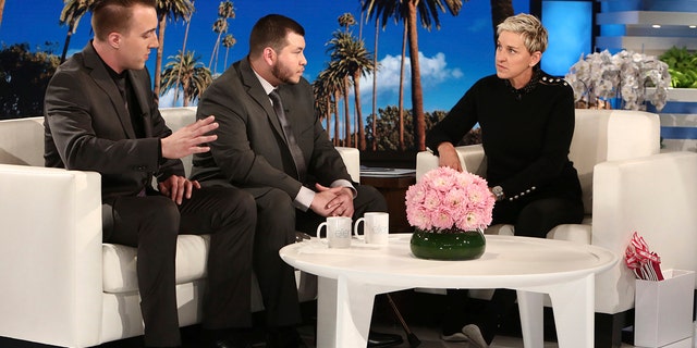 Las Vegas hotel employees Stephen Schuck, left, and Jesus Campos talk with TV host Ellen DeGeneres during a show taped earlier this month.