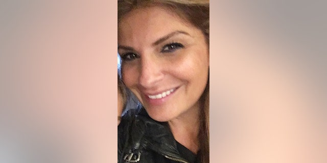 Ellie Holman said she was detained along with her daughter after drinking a glass of wine on an Emirates flight to Dubai.