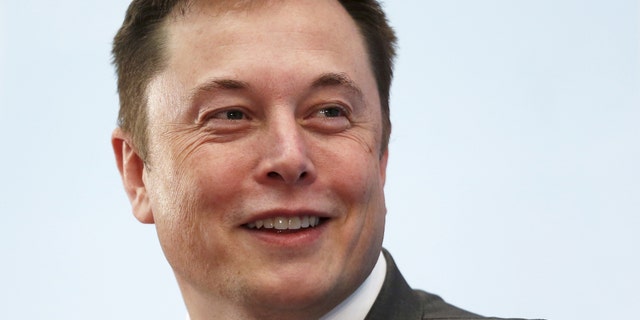 Tesla Chief Executive Elon Musk smiles as he attends a forum on startups in Hong Kong, China January 26, 2016. REUTERS/Bobby Yip/File Photo - RTX2D6RR