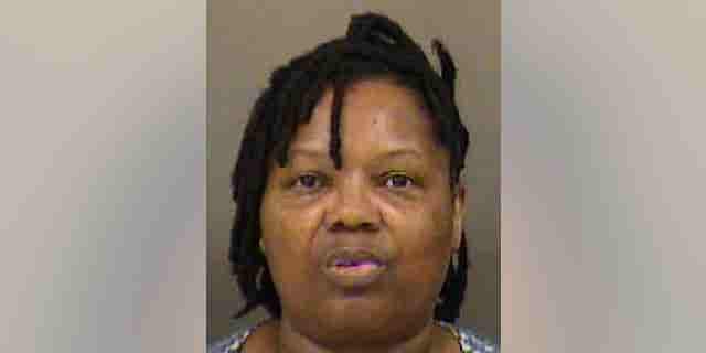 American Airlines employee Elvira Thomas was arrested after she allegedly went through a security checkpoint at the Charlotte airport with a stolen gun.