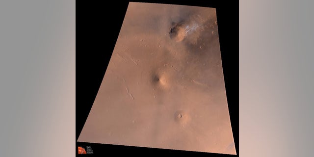 Volcanoes on Mars like Elysium Mons, whose volcanic region is pictured here, grew much slower than their counterparts on Earth, a new study has found.